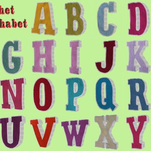 May include: Crochet 3D Alphabet: A set of 26 colorful, crocheted letters, each with a white outline, arranged in alphabetical order. The letters are displayed against a light green background.