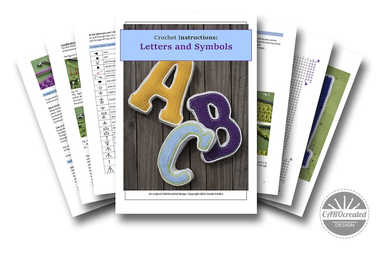 May include: Crochet instructions for letters and symbols. The image shows a close-up of three crocheted letters, A, B, and C, in yellow, purple, and blue, on a wooden background. The letters are part of a crochet pattern.