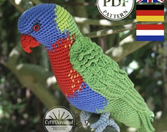 May include: Crochet pattern PDF for a colorful parrot amigurumi toy. The parrot is green, blue, red, and yellow. The pattern is available in English, German, and Dutch. The pattern is available as a digital download.