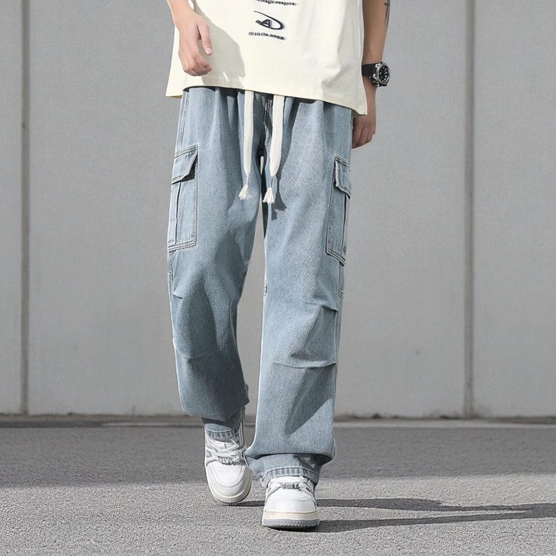 Men's Cargo Baggy Jeans | Straight Leg Denim Pants | Utility Pocket Streetwear Trousers | Y2K Fashion Gift for Him
.
Men’s baggy cargo jeans with straight-leg cut, elastic waist, and utility pockets, casual streetwear Y2K denim trousers.