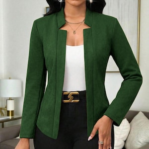 Women's Suede Jacket | Open Front Casual Blazer Coat | Chic Long Sleeve Outerwear | Elegant Fashion Layering Piece
.
Women's suede jacket with button details and open front design, tailored for chic layering and versatile outerwear. A stylish blazer-style coat for casual or formal outfits.