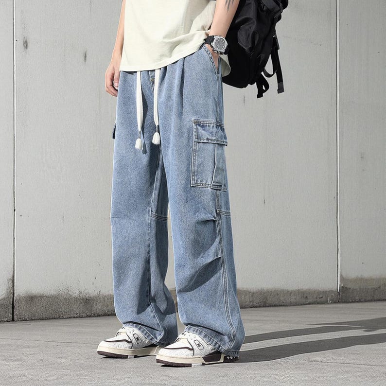 Men's Cargo Baggy Jeans | Straight Leg Denim Pants | Utility Pocket Streetwear Trousers | Y2K Fashion Gift for Him
.
Men’s baggy cargo jeans with straight-leg cut, elastic waist, and utility pockets, casual streetwear Y2K denim trousers.