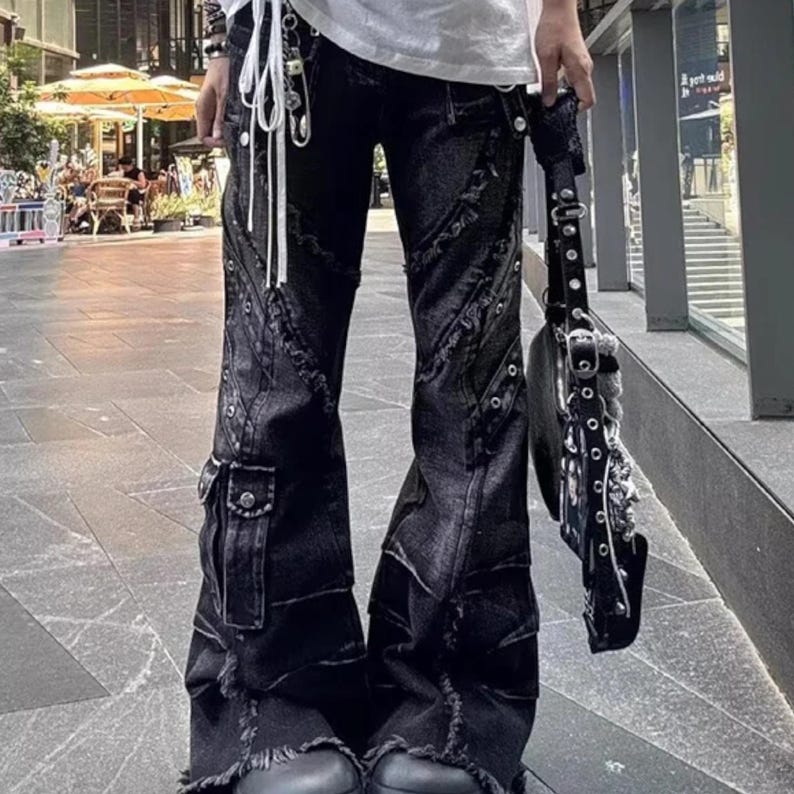Women's Baggy Cargo Pants | Patchwork Denim Trouser Jeans | Streetwear Vintage Y2k Outfits

Model wearing baggy patchwork cargo denim pants with wide legs and grunge streetwear styling.