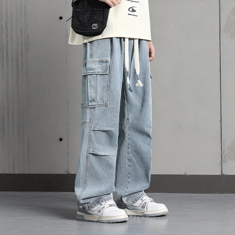 Men's Cargo Baggy Jeans | Straight Leg Denim Pants | Utility Pocket Streetwear Trousers | Y2K Fashion Gift for Him
.
Men’s baggy cargo jeans with straight-leg cut, elastic waist, and utility pockets, casual streetwear Y2K denim trousers.
