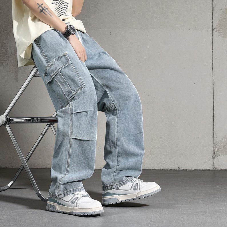 Men's Cargo Baggy Jeans | Straight Leg Denim Pants | Utility Pocket Streetwear Trousers | Y2K Fashion Gift for Him
.
Men’s baggy cargo jeans with straight-leg cut, elastic waist, and utility pockets, casual streetwear Y2K denim trousers.