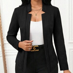 Women's Suede Jacket | Open Front Casual Blazer Coat | Chic Long Sleeve Outerwear | Elegant Fashion Layering Piece
.
Women's suede jacket with button details and open front design, tailored for chic layering and versatile outerwear. A stylish blazer-style coat for casual or formal outfits.