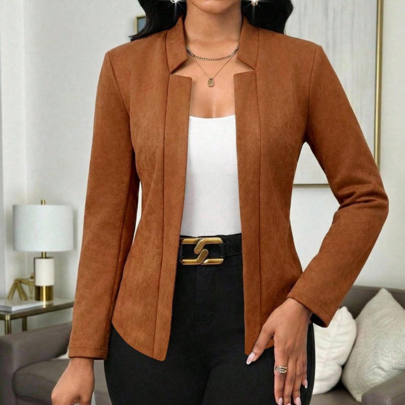 Women's Suede Jacket | Open Front Casual Blazer Coat | Chic Long Sleeve Outerwear | Elegant Fashion Layering Piece
.
Women's suede jacket with button details and open front design, tailored for chic layering and versatile outerwear. A stylish blazer-style coat for casual or formal outfits.
