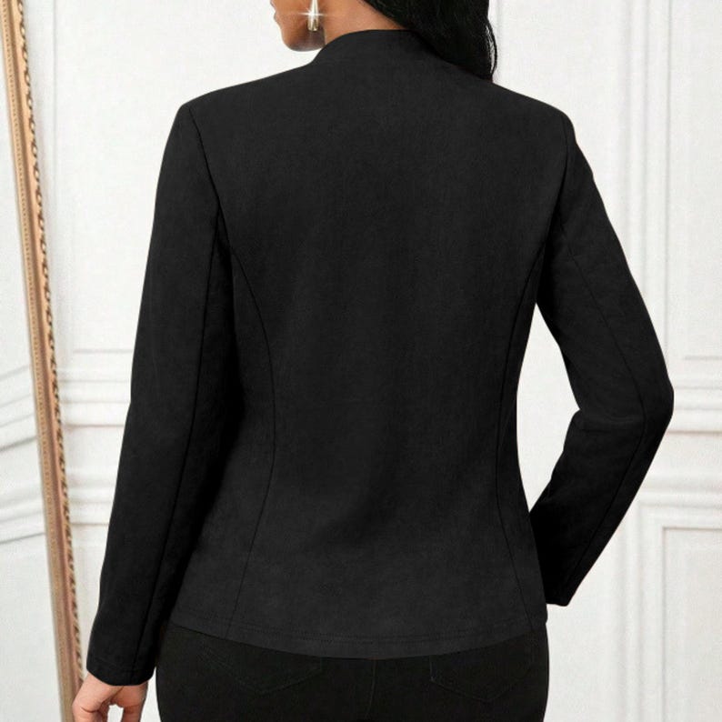 Women's Suede Jacket | Open Front Casual Blazer Coat | Chic Long Sleeve Outerwear | Elegant Fashion Layering Piece
.
Women's suede jacket with button details and open front design, tailored for chic layering and versatile outerwear. A stylish blazer-style coat for casual or formal outfits.