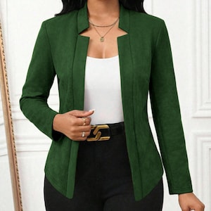 Women's Suede Jacket | Open Front Casual Blazer Coat | Chic Long Sleeve Outerwear | Elegant Fashion Layering Piece
.
Women's suede jacket with button details and open front design, tailored for chic layering and versatile outerwear. A stylish blazer-style coat for casual or formal outfits.