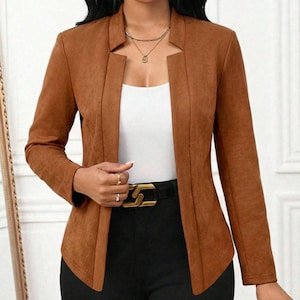 Women's Suede Jacket | Open Front Casual Blazer Coat | Chic Long Sleeve Outerwear | Elegant Fashion Layering Piece
.
Women's suede jacket with button details and open front design, tailored for chic layering and versatile outerwear. A stylish blazer-style coat for casual or formal outfits.
