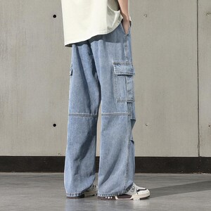 Men's Cargo Baggy Jeans | Straight Leg Denim Pants | Utility Pocket Streetwear Trousers | Y2K Fashion Gift for Him
.
Men’s baggy cargo jeans with straight-leg cut, elastic waist, and utility pockets, casual streetwear Y2K denim trousers.