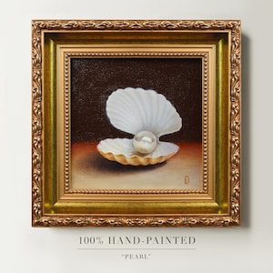 May include: A hand-painted artwork in a gold frame shows a pearl within an open seashell. The frame has detailed embellishments. The text at the bottom reads "100% HAND-PAINTED" and "PEARL".