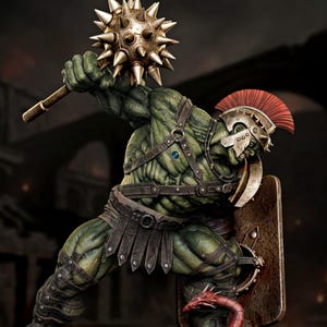 Puede incluir: Una figura verde de gladiador con una maza con púas y un escudo, con un casco con plumas rojas. La estatua está sobre una base rocosa con criaturas rojas. La estatua está etiquetada como "RESIN & FDM" y "SCALE 1/6". La palabra "WICKED" es visible.