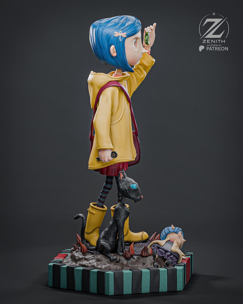 May include: A detailed figurine of a girl with blue hair wearing a yellow coat and boots, holding a green object. A black cat and a smaller figure are at her feet. The base is striped with black, green, and red.