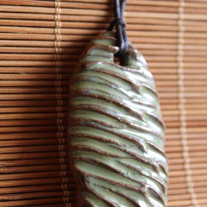 Cocoon: Green Textured Clay Adjustable Cord Necklace N701 image 3