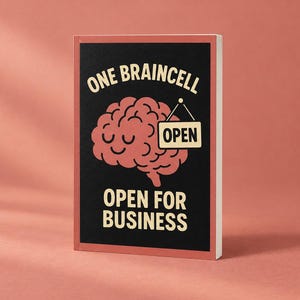 May include: A rectangular book with a black cover featuring a pink brain illustration with a smiling face. The text reads ONE BRAINCELL at the top, OPEN on a small hanging sign, and OPEN FOR BUSINESS at the bottom in cream-colored lettering.