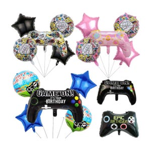 May include: A selection of colourful birthday balloons in various shapes. The balloons include star and controller shapes, with text that reads "Game On! It's Your Birthday" and "Happy Birthday".