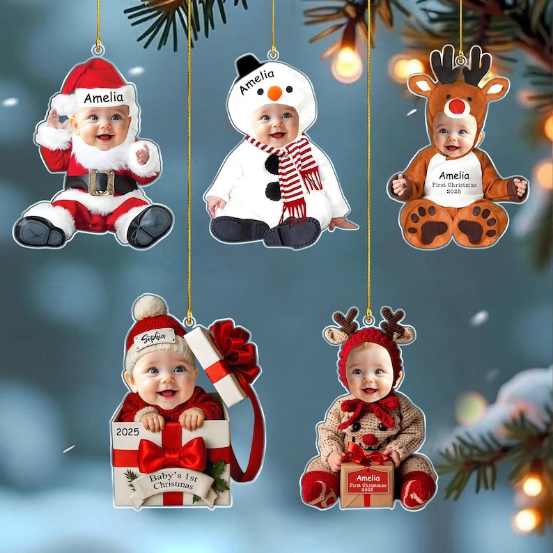 May include: Five personalized Christmas ornaments featuring photos of babies in holiday costumes. One shows a baby as Santa, one as a snowman, one as a reindeer, one in a gift box, and one in a reindeer hat holding a gift box with the name Amelia or Sophia.