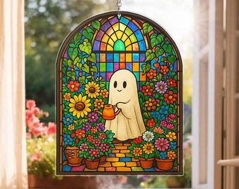 May include: Stained glass window art featuring a friendly ghost watering colorful flowers. The window has a rainbow-colored arched top and a brick-like base. The ghost is holding an orange watering can, surrounded by sunflowers and other blooms.