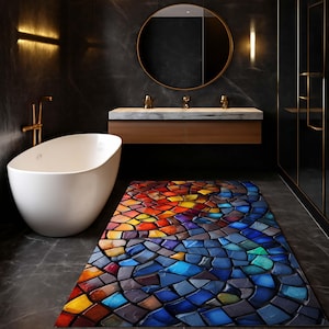 Peut inclure: Une salle de bain moderne avec une baignoire blanche de forme ovale et un tapis de bain coloré de style mosaïque. Le tapis présente un motif vibrant de formes géométriques rouges, oranges, jaunes, bleues et violettes. La salle de bain a des murs sombres, une vanité en bois et un miroir rond.