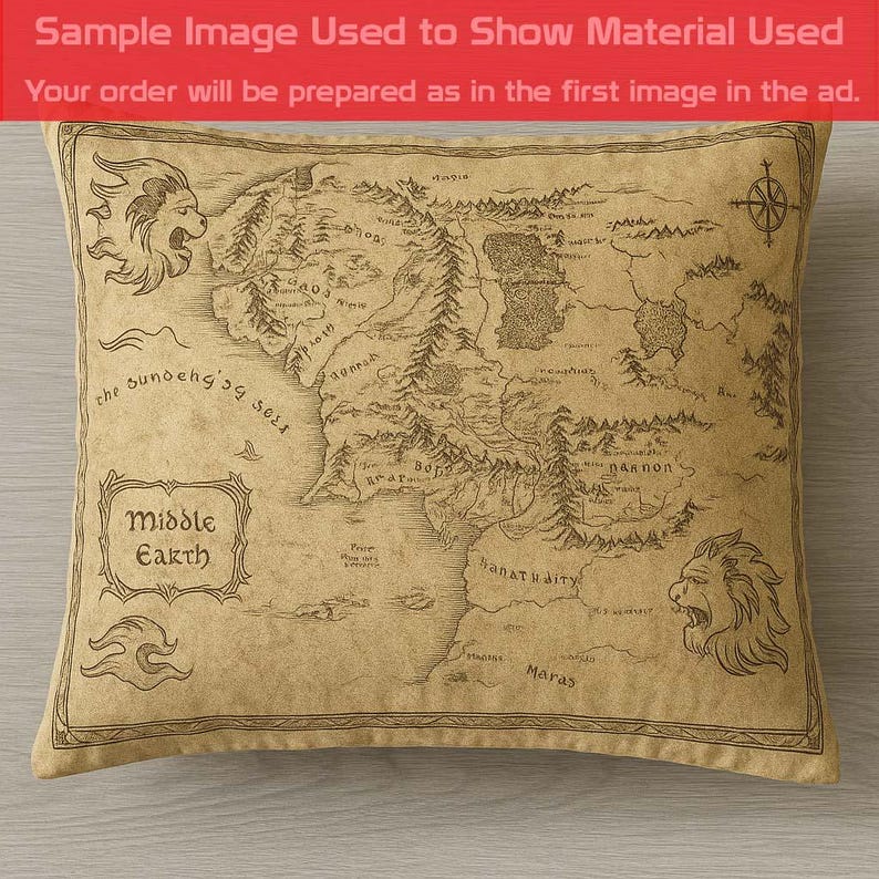 May include: Square pillow featuring a detailed map of Middle Earth in sepia tones. The pillow has a vintage aesthetic, with decorative elements including lion heads and a compass rose. The text "Middle Earth" is displayed prominently.