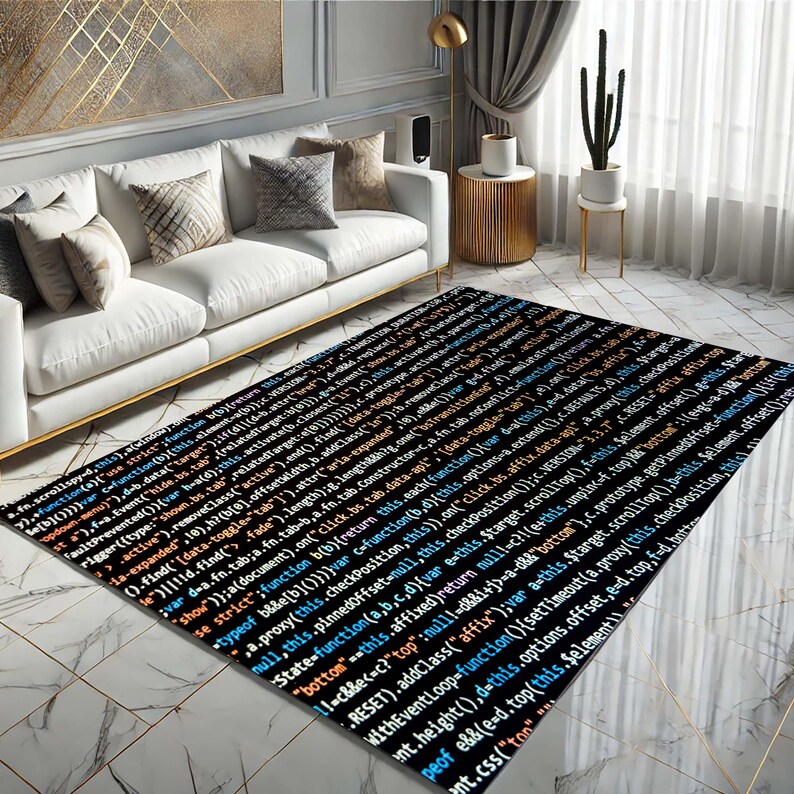 May include: A black and white rug with a code pattern printed on it. The rug is in a living room setting with a white sofa and a potted cactus.