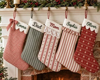 May include: Five personalized Christmas stockings hanging in a row. The stockings feature various patterns including red gingham, green stripes, and red reindeer prints, with names Emma, Dad, Mom, Sophie, and Oliver embroidered on the white cuffs.