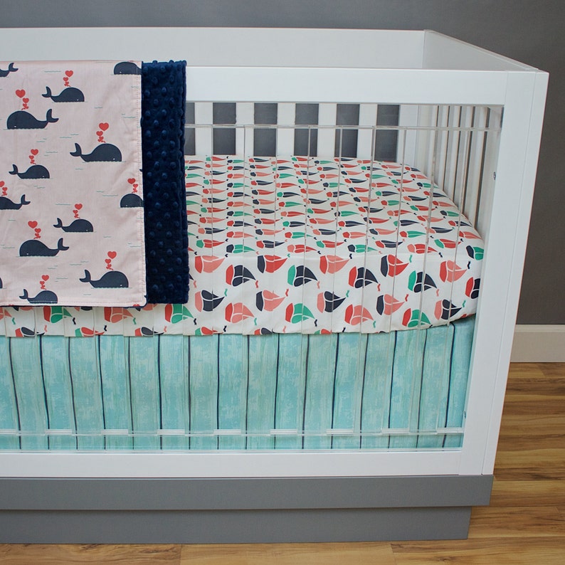 coral and navy nursery bedding