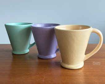 3 Cyclamen Julie Sanders Handled Mugs Green Purple Yellow California Ceramic 4" // Condition: Very light wear such as marks,scratches,scuffs