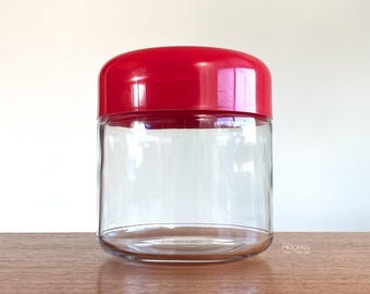 Modern Heller Glass Storage Jar Canister Red Plastic Lid // Condition: Light wear,scratches,scuffs to lid and glass