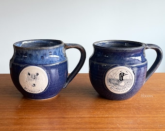 John Deneen Minnesota Eastern Timber Wolf and Loon Motif Mugs Blue Drip Glaze Studio Pottery // Condition: Crazing ~ Base chipping
