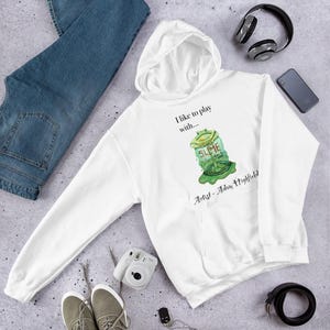 May include: White hoodie featuring a green slime graphic and the text "I like to play with..." and "Artist - Adam Highfield".