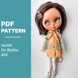 May include: A Blythe doll wearing a yellow jacket with a bunny pattern and green plaid sleeves and pockets. The doll has brown hair and is wearing white tights and shoes. The text "PDF PATTERN" and "Jacket for Blythe doll" are visible.