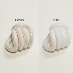 May include: Two images side-by-side show a white, coiled object. The left image, labelled "BEFORE," displays the object with a pearlescent finish and hints of pink and green. The right image, labelled "AFTER," shows the same object in solid white.