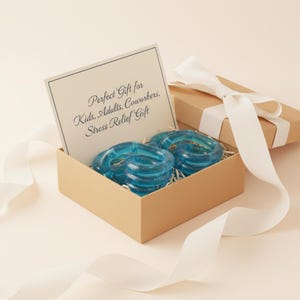 Brinquedo antiestresse Tangle azul translúcido – Brinquedo sensorial articulado para alívio do estresse imagem 4