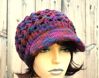 Newsboy hat knit with lacy waves in a rainbow of colors.  Stylish for anything