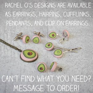 May include: A variety of avocado-themed jewelry, including earrings, hairpins, cufflinks, pendants, and clip-on earrings. The jewelry is made with pink fabric and features a green avocado design. The text "RACHEL O'S DESIGNS ARE AVAILABLE AS EARRINGS, HAIRPINS, CUFFLINKS, PENDANTS, AND CLIP ON EARRINGS. CAN'T FIND WHAT YOU NEED? MESSAGE TO ORDER!" is visible in the image.