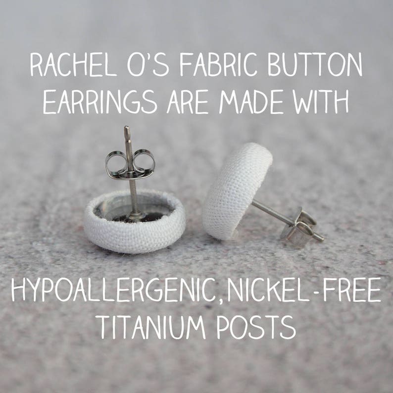 May include: White fabric button earrings with hypoallergenic, nickel-free titanium posts. "RACHEL O'S FABRIC BUTTON EARRINGS ARE MADE WITH HYPOALLERGENIC, NICKEL-FREE TITANIUM POSTS" text is visible in the image.