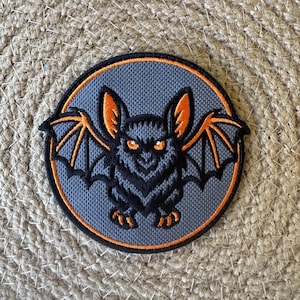 Bat Embroidered Patch – Black Bat Badge | Orange Eyes Bat Applique | Sew-On, Iron-On, Velcro Patch for Jackets, Backpacks & Caps