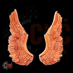May include: A pair of detailed, orange-colored angel wings. The wings are sculpted with intricate feather details and are symmetrical.