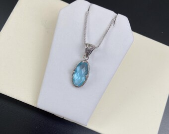 Beautiful sky blue topaz necklace handmade in sterling silver with a beautiful blue topaz