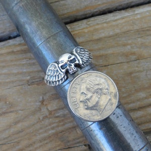 Winged skull ring handmade in sterling silver