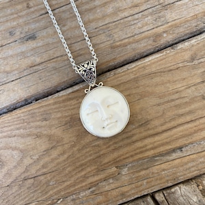 Moon Face necklace handmade in sterling silver 925 with a moon face carved from bone