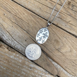 Beautiful Fleur De Lis necklace handmade in sterling silver 925 with a 18&quot; chain also in sterling silver 925