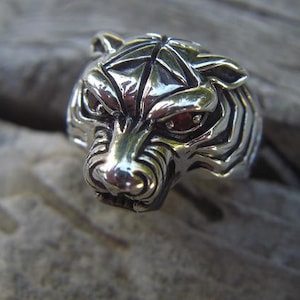 Tiger ring in sterling silver with red cz's in the eyes