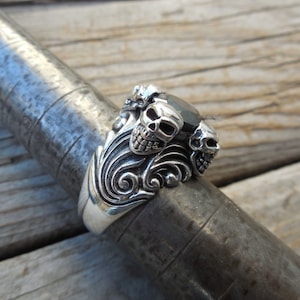 Skull ring handmade in sterling silver with a black CZ