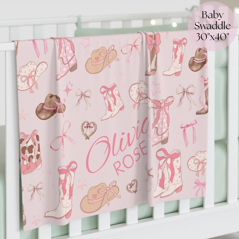 Custom cowgirl fleece blanket with pink fringe edges, an adorable and cozy western girl gift for birthdays, baby showers, or as a charming addition to a country-style nursery.