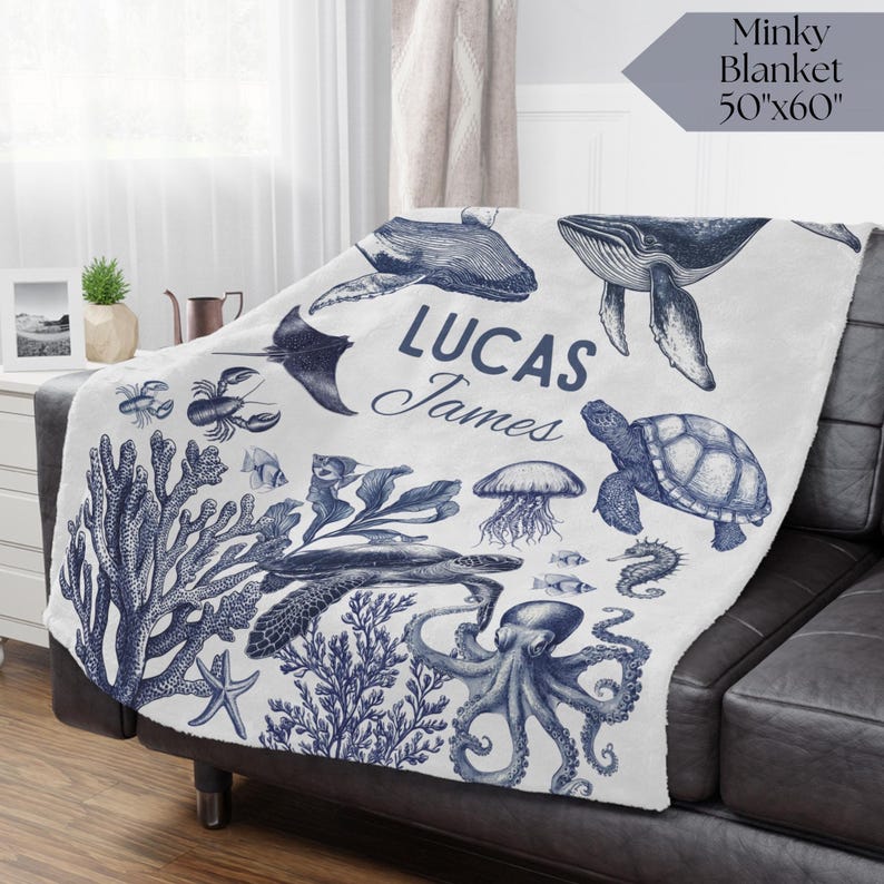 Nautical Nursery Decor Blanket with Ocean Turtle Print – Beautiful baby crib blanket with sea life and toile elements, perfect for an ocean baby shower gift.