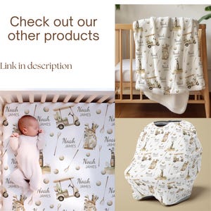 May include: A baby bedding set with a golf theme, including a crib sheet, blanket, and car seat cover. The items feature golf carts, golf clubs, and golf balls on a white background. The name "Noah James" is also printed on the items. The text "Check out our other products" and "Link in description" are also visible.
