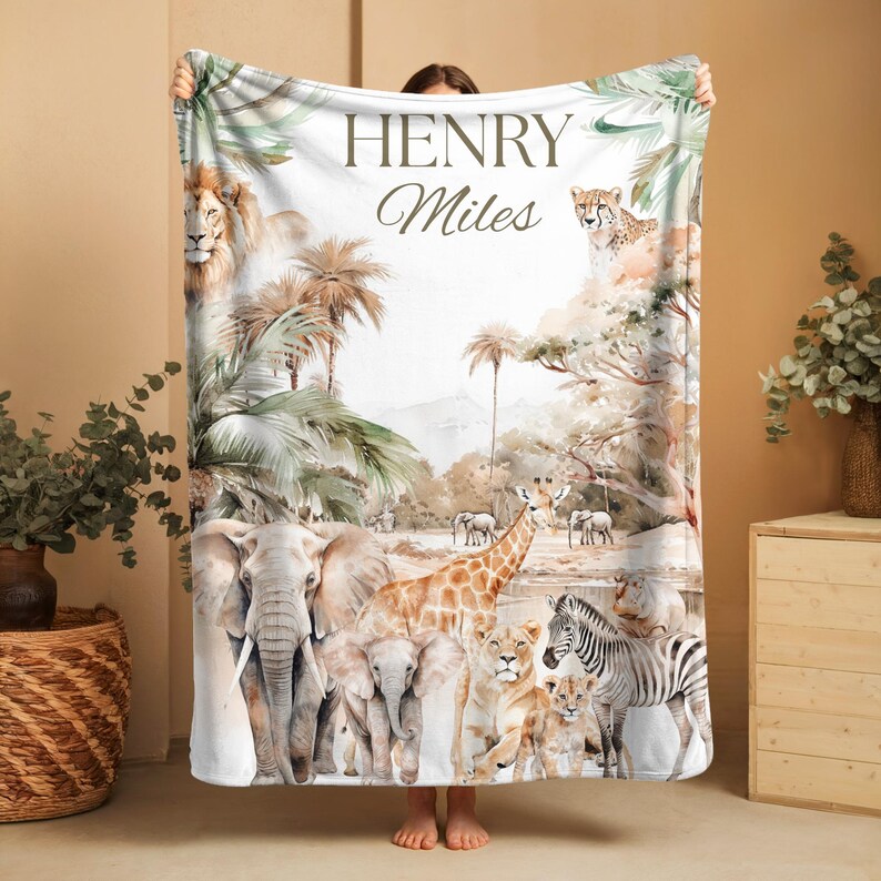 Safari-themed personalized baby blanket with boy’s name, soft plush material for newborns, toddlers, and safari nursery or jungle room décor.